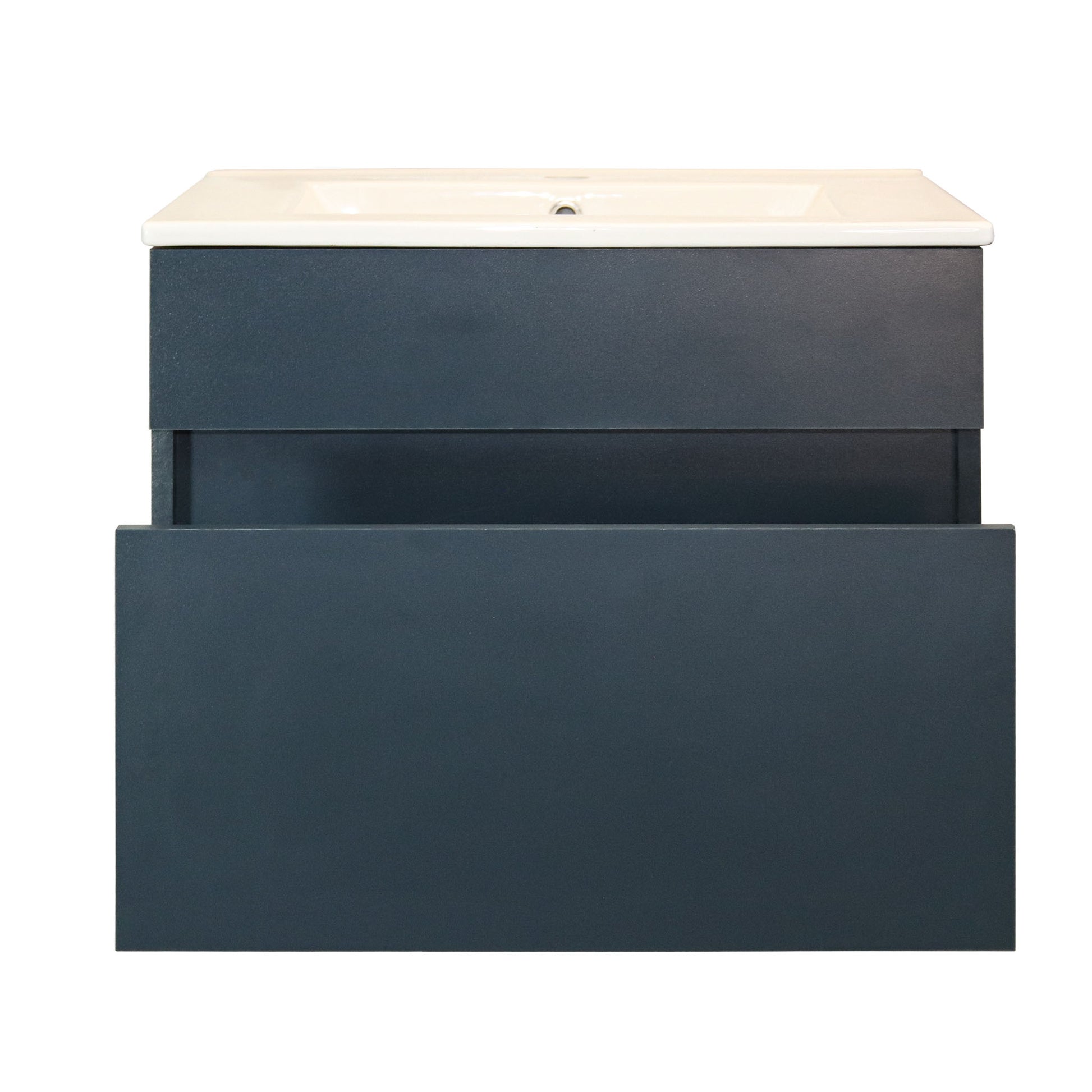 Open drawer on bathroom vanity with dark blue cabinet and white ceramic basin on a white background