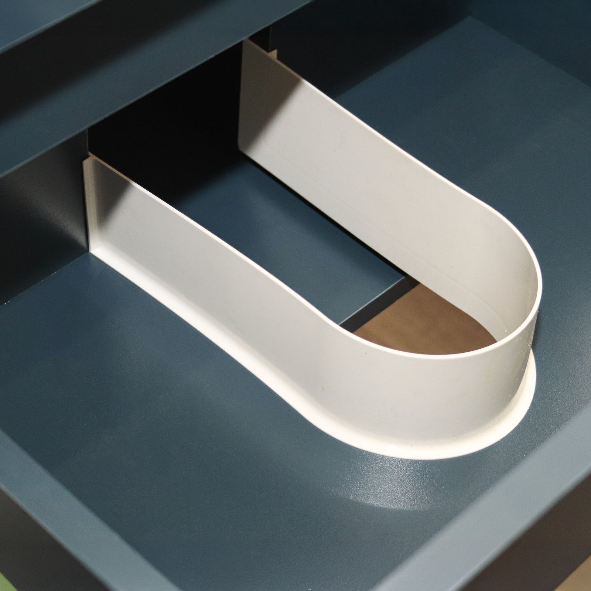 U-channel to protect cabinet from moisture.